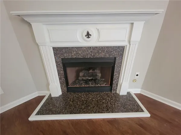 a living room with a fireplace