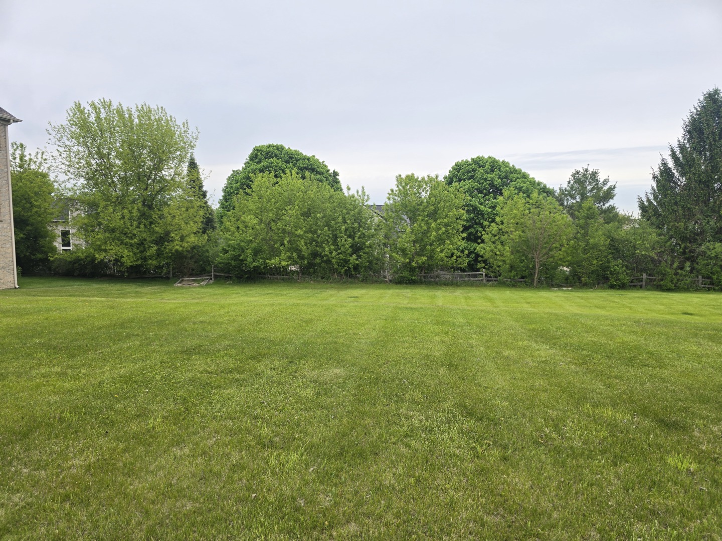 5 Springbrook Lane Algonquin, IL 60102 - Photo 2 of 4 a view of a field with trees in the background