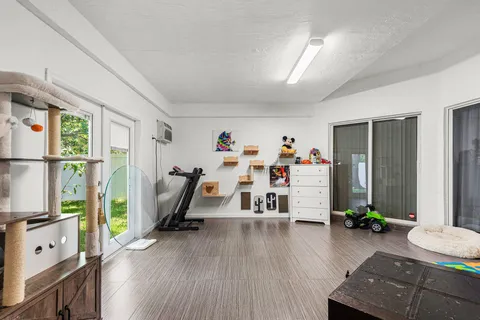 a very nice looking room with gym equipment