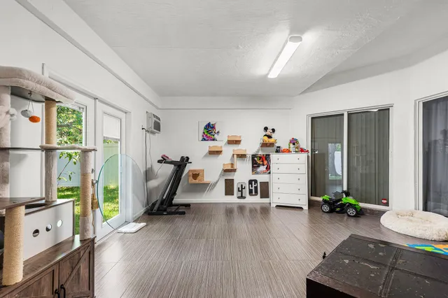 a very nice looking room with gym equipment