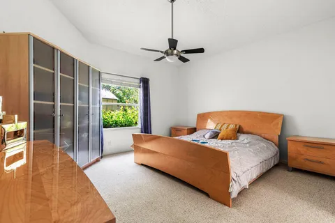 a bedroom with a bed and a walk in closet