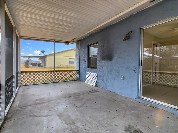 a view of a back yard of a house