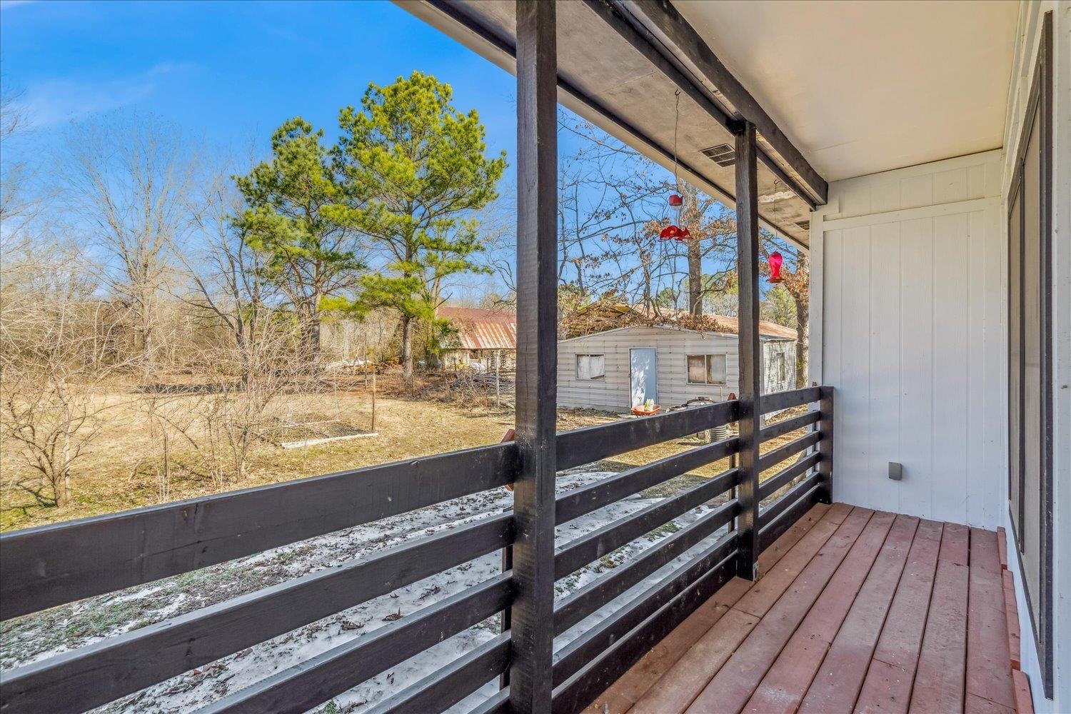 245 Ecology Loop Eads, TN 38028 - Photo 12 of 23 a view of a two chairs and table in a balcony