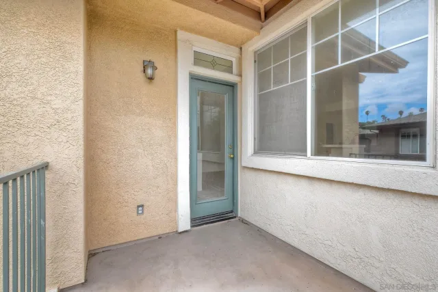 a view of a porch with a backyard