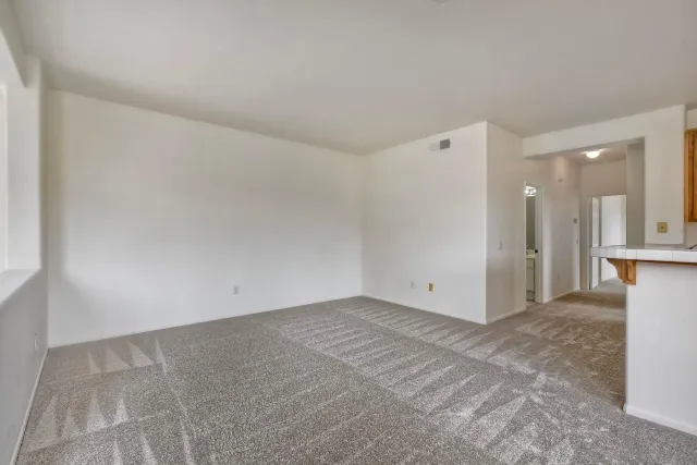 a view of a kitchen with a sink cabinets and a window