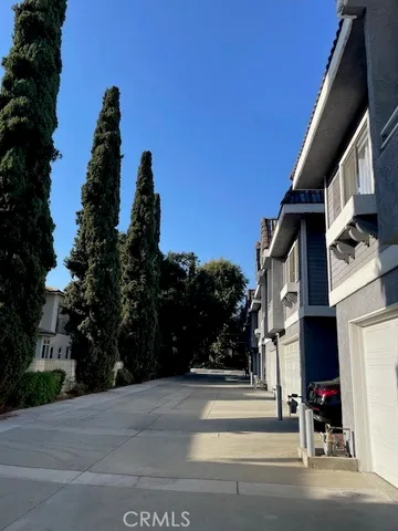 a view of street along with trees