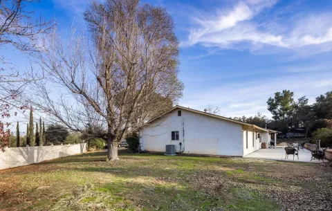 a house view with a garden space