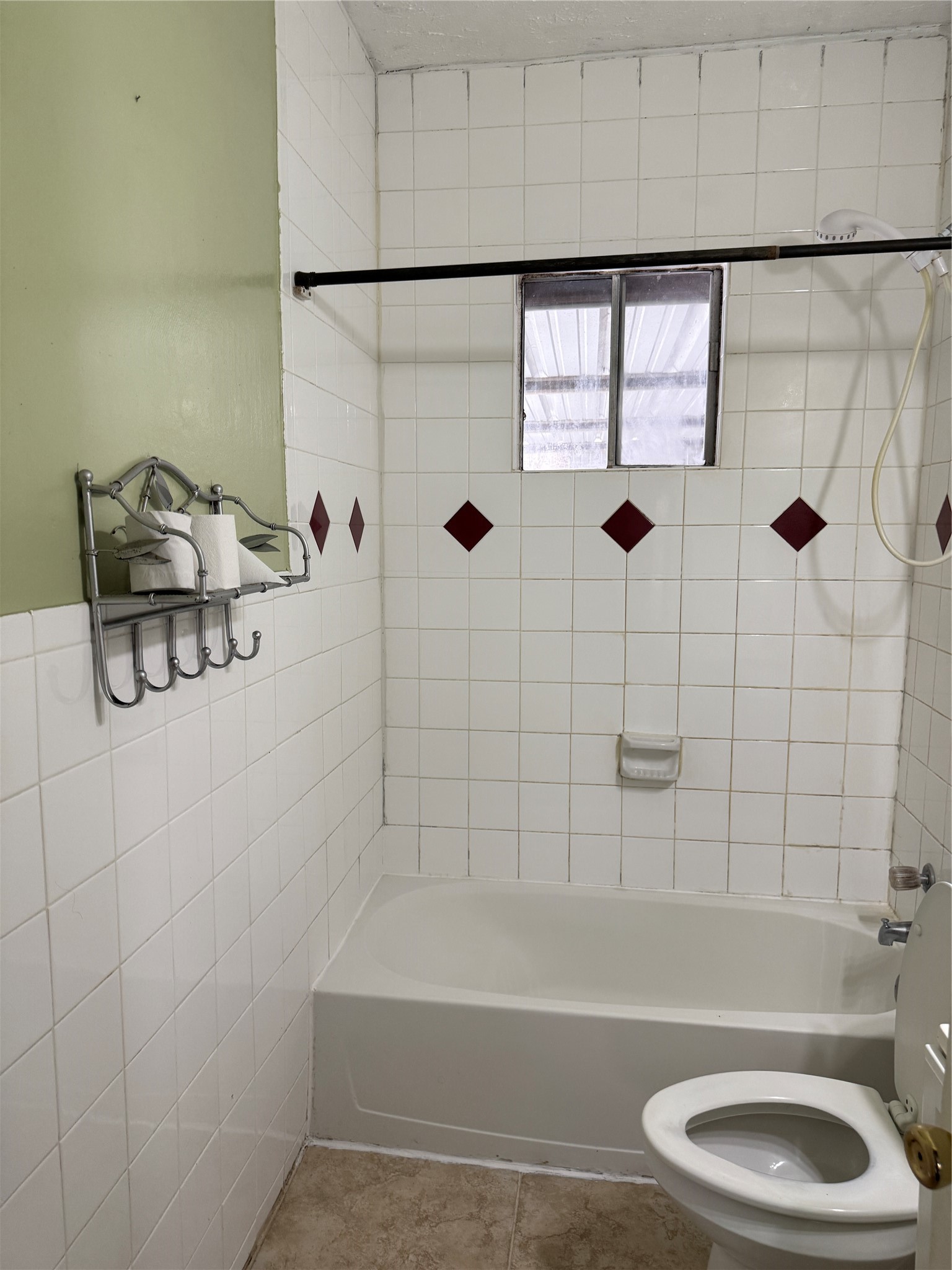 6318 Illinois Street Houston, TX 77021 - Photo 12 of 14 a bathroom with a bathtub and shower