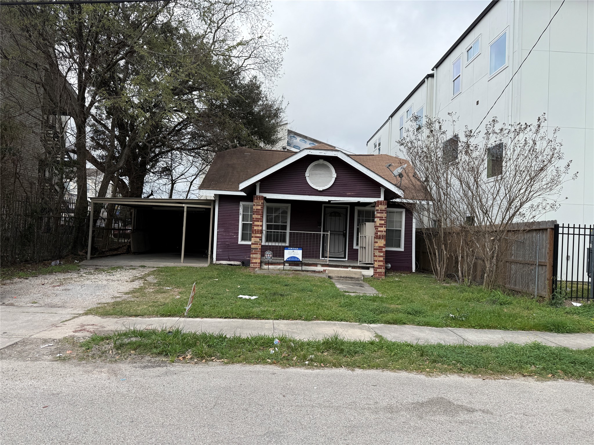 6318 Illinois Street Houston, TX 77021 - Photo 2 of 14 a view of a house with a yard