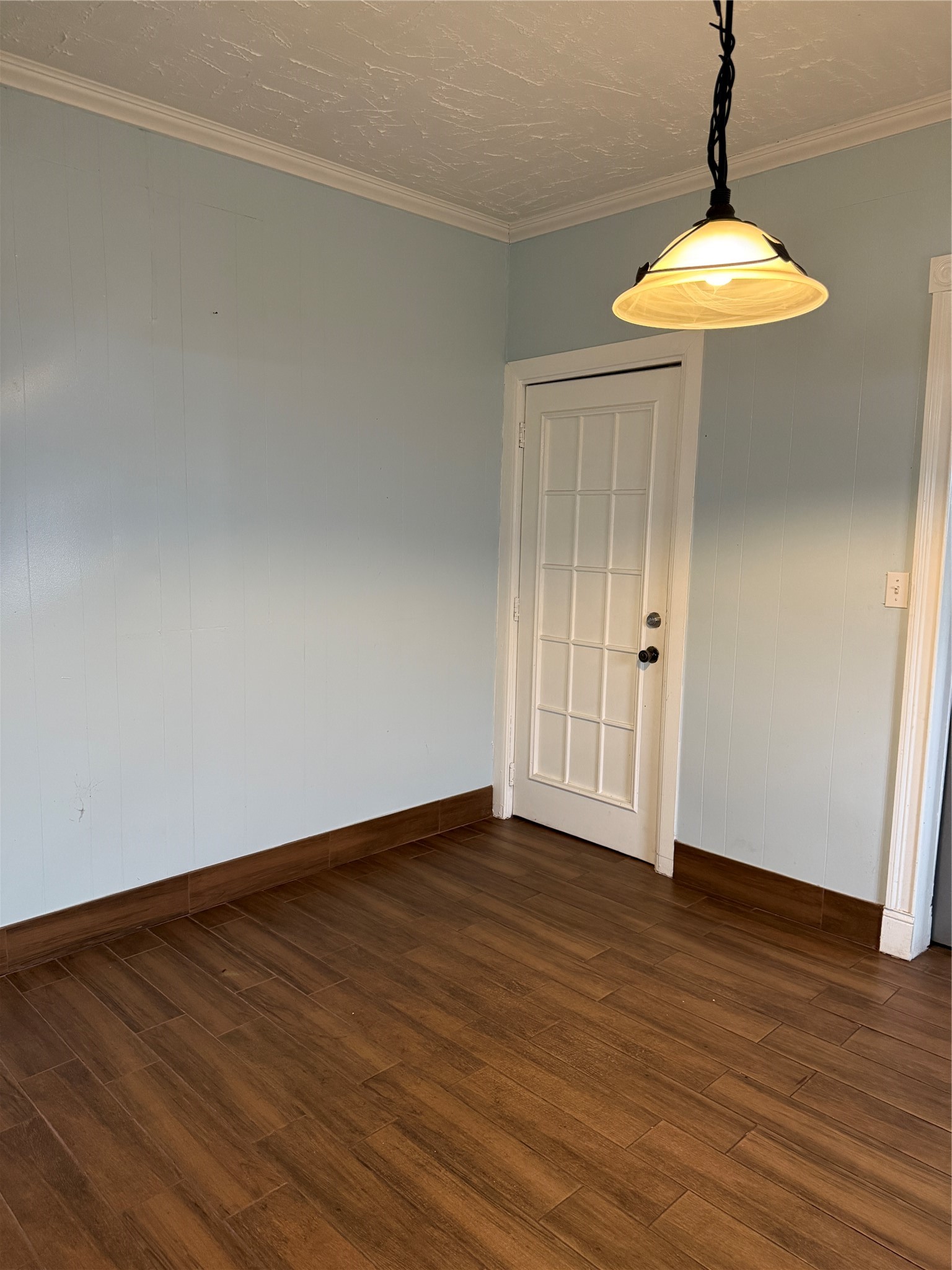 6318 Illinois Street Houston, TX 77021 - Photo 6 of 14 a view of an empty room with wooden floor and a window