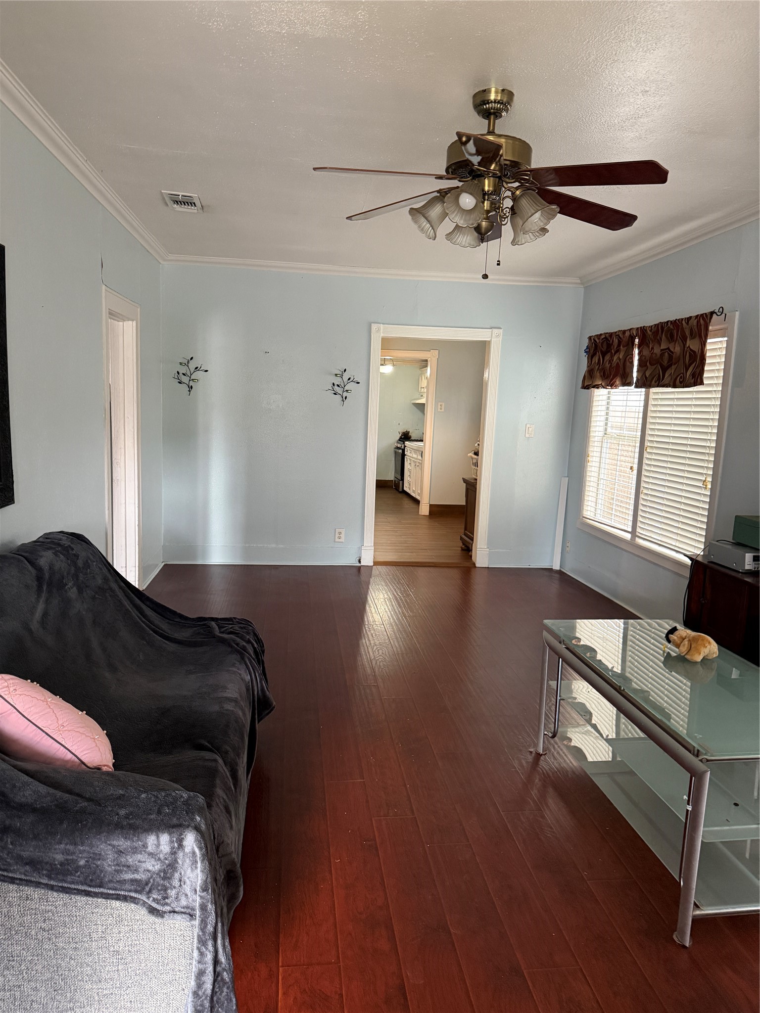 6318 Illinois Street Houston, TX 77021 - Photo 7 of 14 a living room with furniture and wooden floor