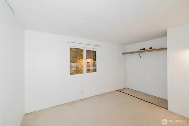 a view of a room with a washer and dryer