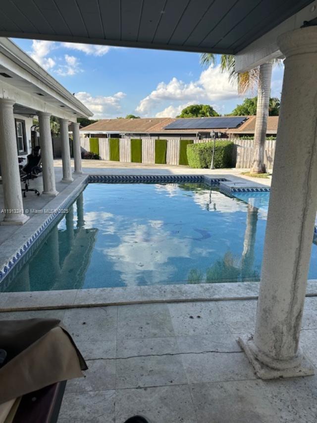 5531 Southwest 136th Court, Unit 1 Miami, FL 33175 - Photo 4 of 13 a view of a house with a porch