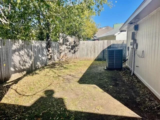 a view of entrance gate with a trees