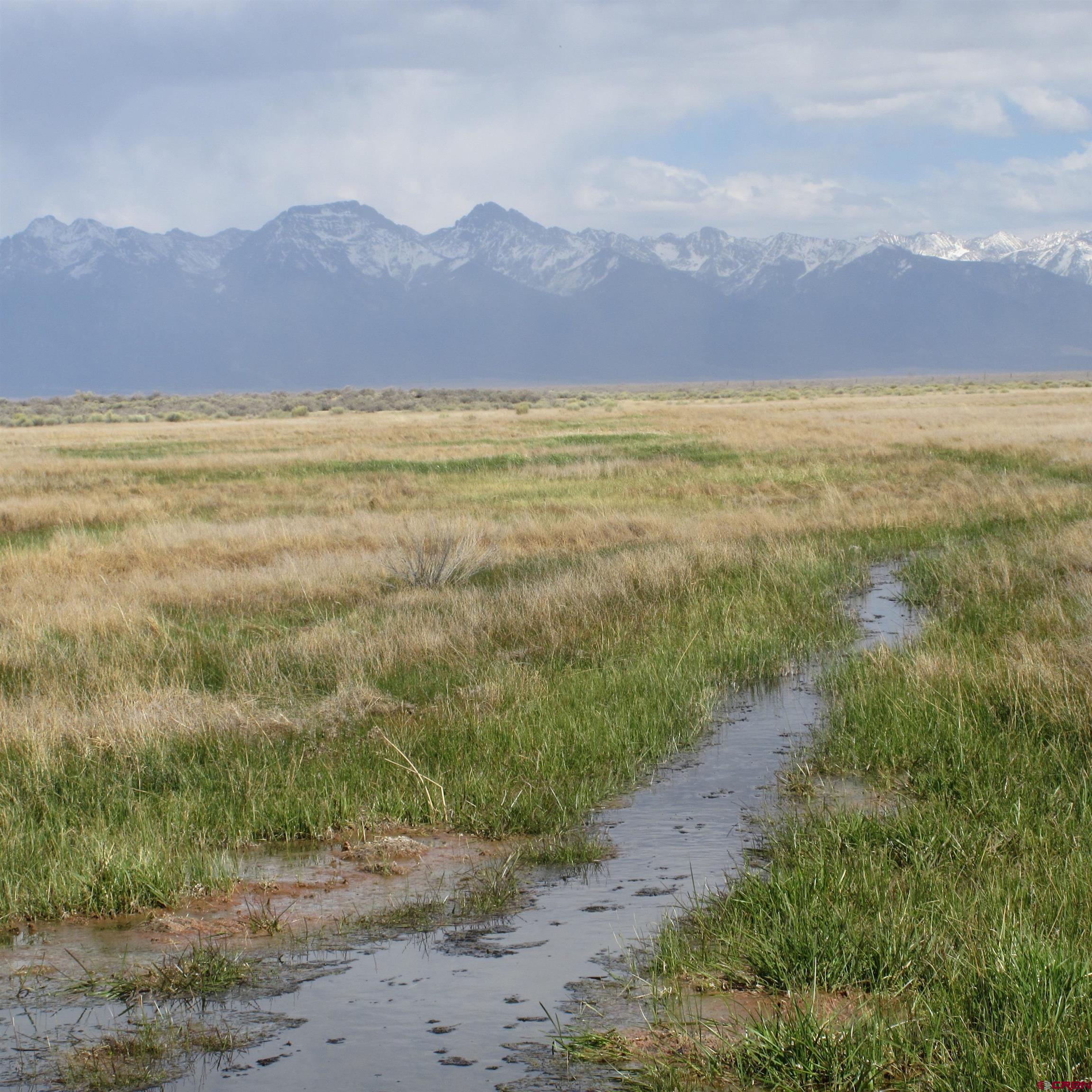 56063 County Road Saguache, CO 81149 - Photo 4 of 21 a view of an ocean and a mountain