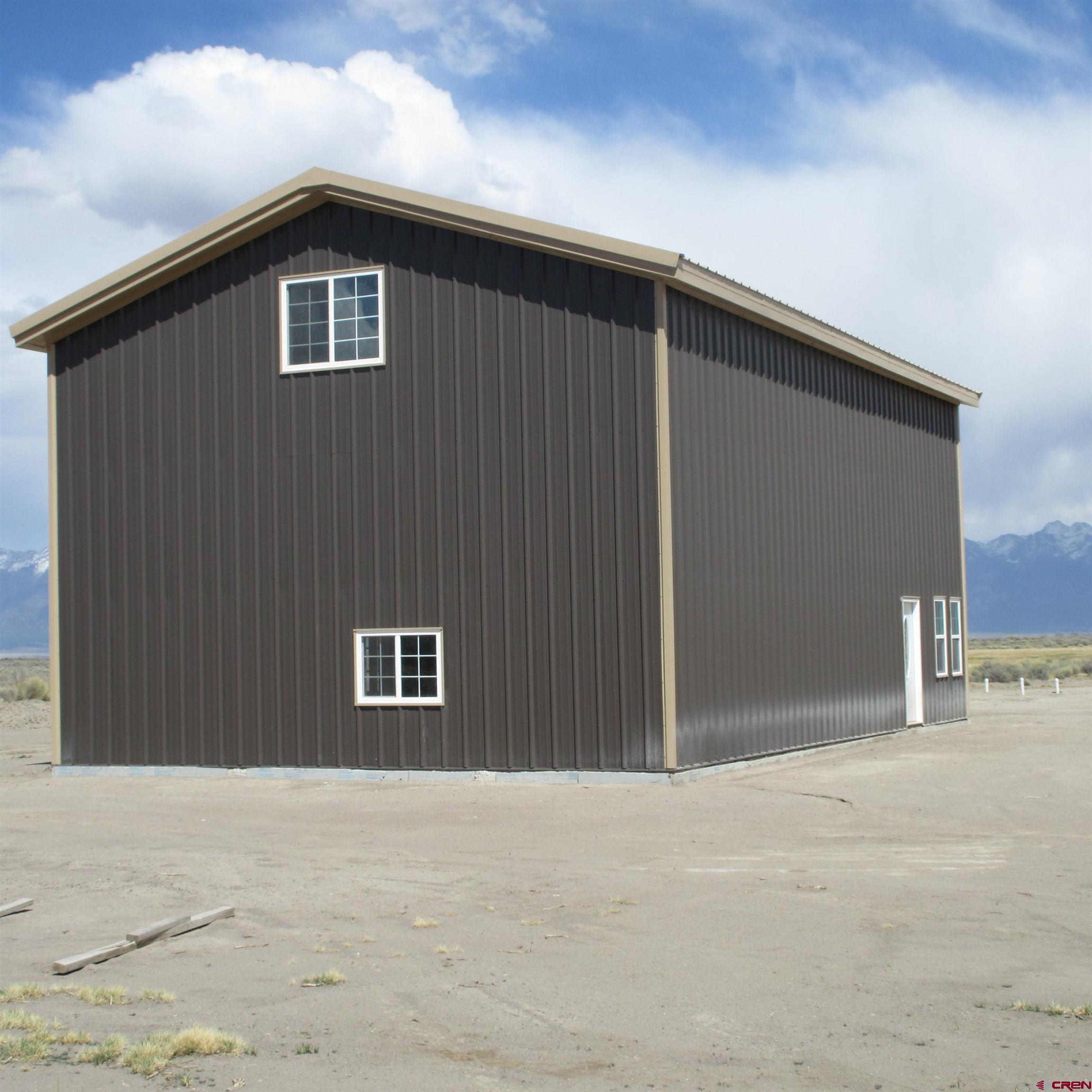 56063 County Road Saguache, CO 81149 - Photo 9 of 21 a front view of a house