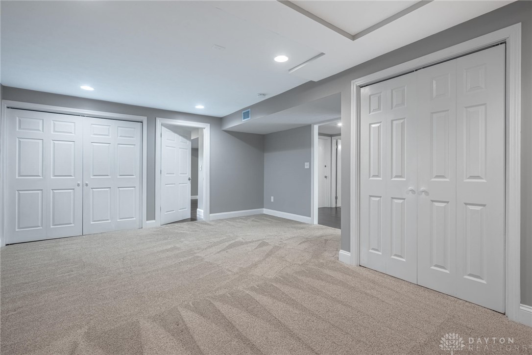 467 West Rahn Road Dayton, OH 45429 - Photo 28 of 41 This spacious area offers ample storage and comfortable carpeting, perfect for diverse living arrangements.