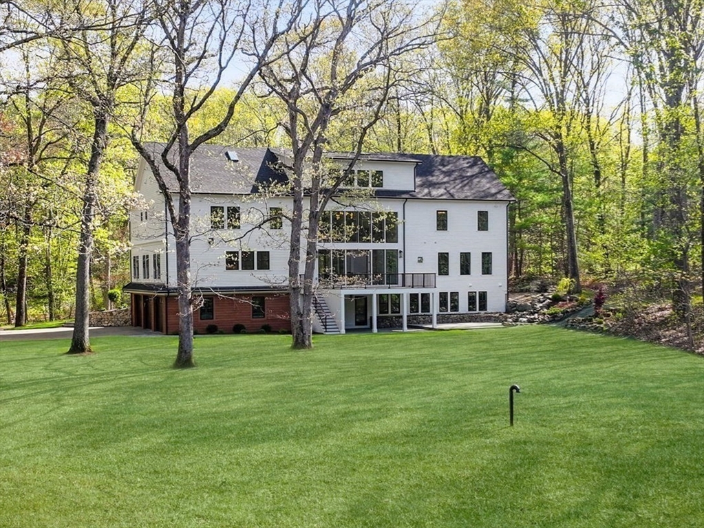 82 Deer Path Lane Weston, MA 02493 - Photo 40 of 42 a view of a house with a yard
