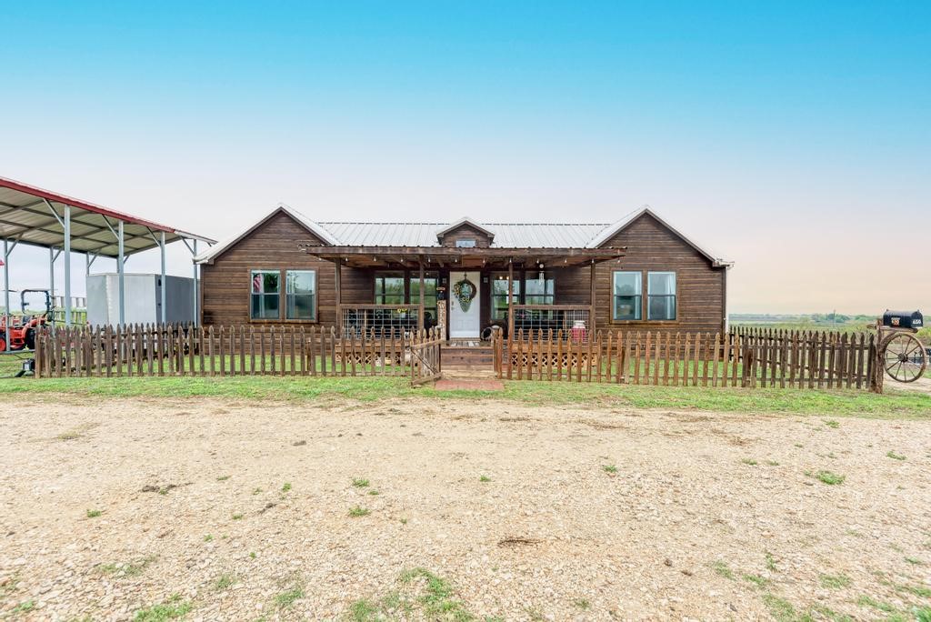 a view of a house with a swimming pool