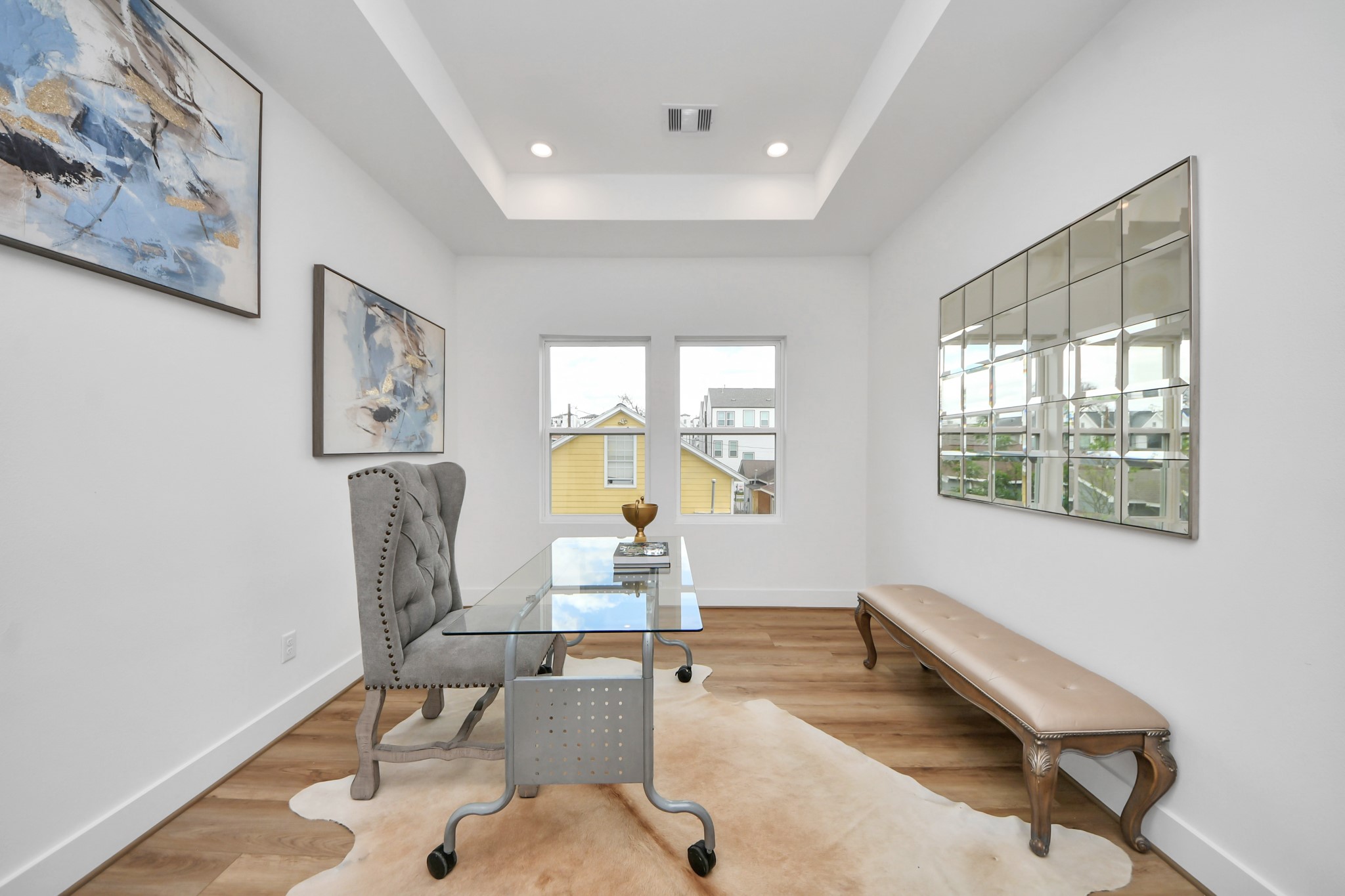 505 Middle Street Houston, TX 77003 - Photo 20 of 46 This bright and stylish office space features sleek modern furnishings, a large window for natural light, and elegant decor, creating an inspiring environment for productivity and creativity.