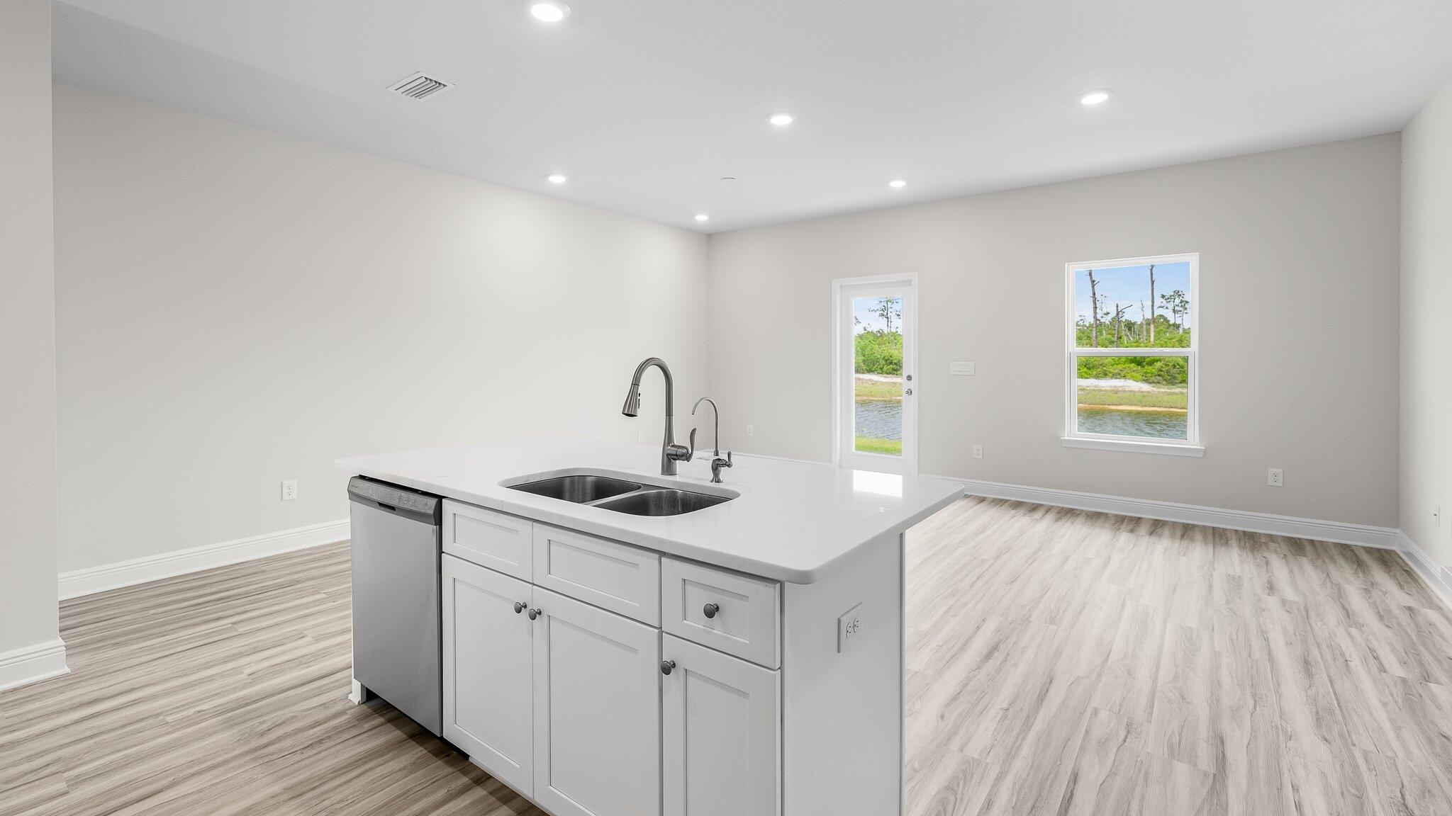 35 Hatton Court Santa Rosa Beach, FL 32459 - Photo 7 of 14 a kitchen with a sink and wooden floor