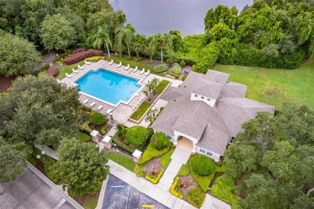 an aerial view of a house with a garden