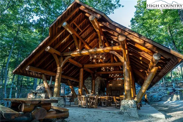 a view of a wooden door with a tree