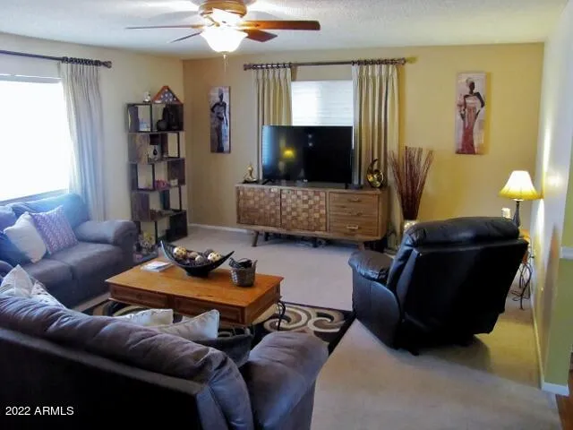 a living room with furniture and a couch