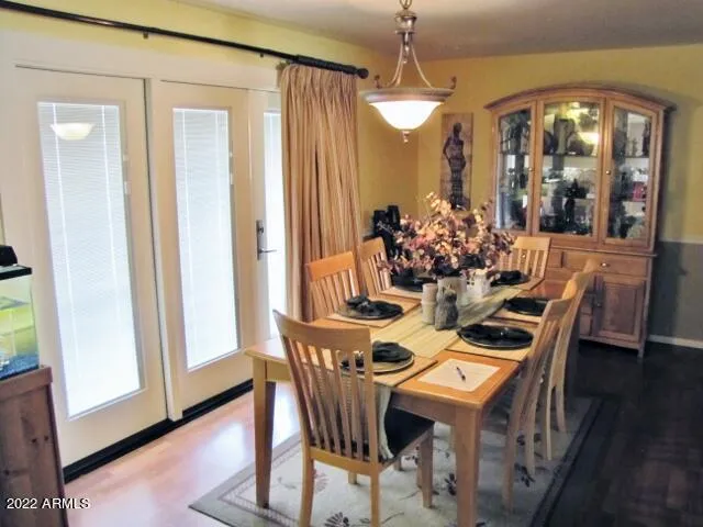 a room with toys and a wooden floor