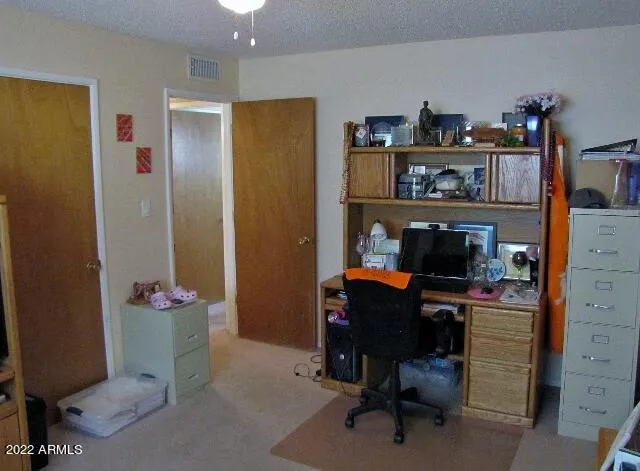 a bedroom with a bed and furniture