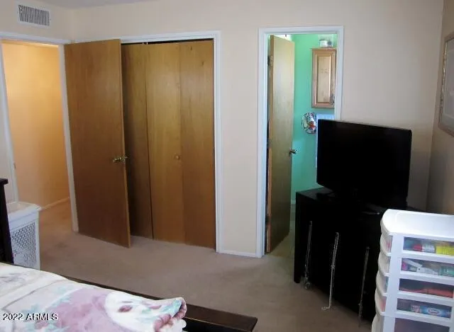 a bathroom with a sink toilet and mirror