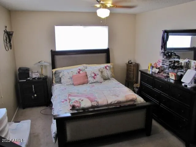 a room with a table and a fireplace