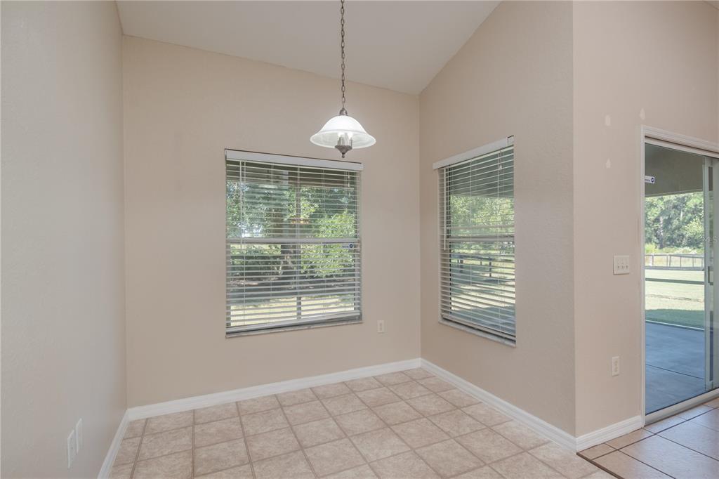 6375 Southwest 63rd Street Ocala, FL 34474 - Photo 16 of 35 a view of an empty room with windows
