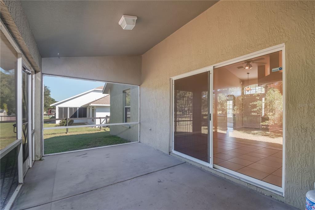 6375 Southwest 63rd Street Ocala, FL 34474 - Photo 25 of 35 a view of livingroom with furniture and floor to ceiling window