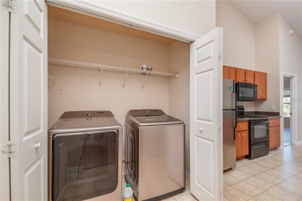 6375 Southwest 63rd Street Ocala, FL 34474 - Photo 26 of 35 a utility room with dryer and washer