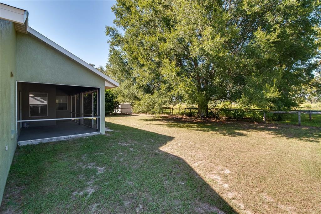 6375 Southwest 63rd Street Ocala, FL 34474 - Photo 34 of 35 a view of outdoor space with deck and yard