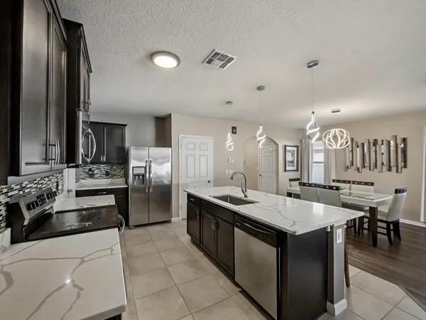 $449,000 | 10086 Southwest Newberry Avenue, Port St. Lucie, FL 34987