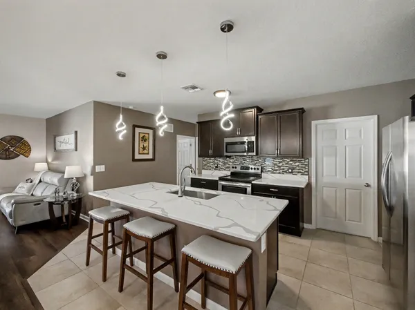 $449,000 | 10086 Southwest Newberry Avenue, Port St. Lucie, FL 34987