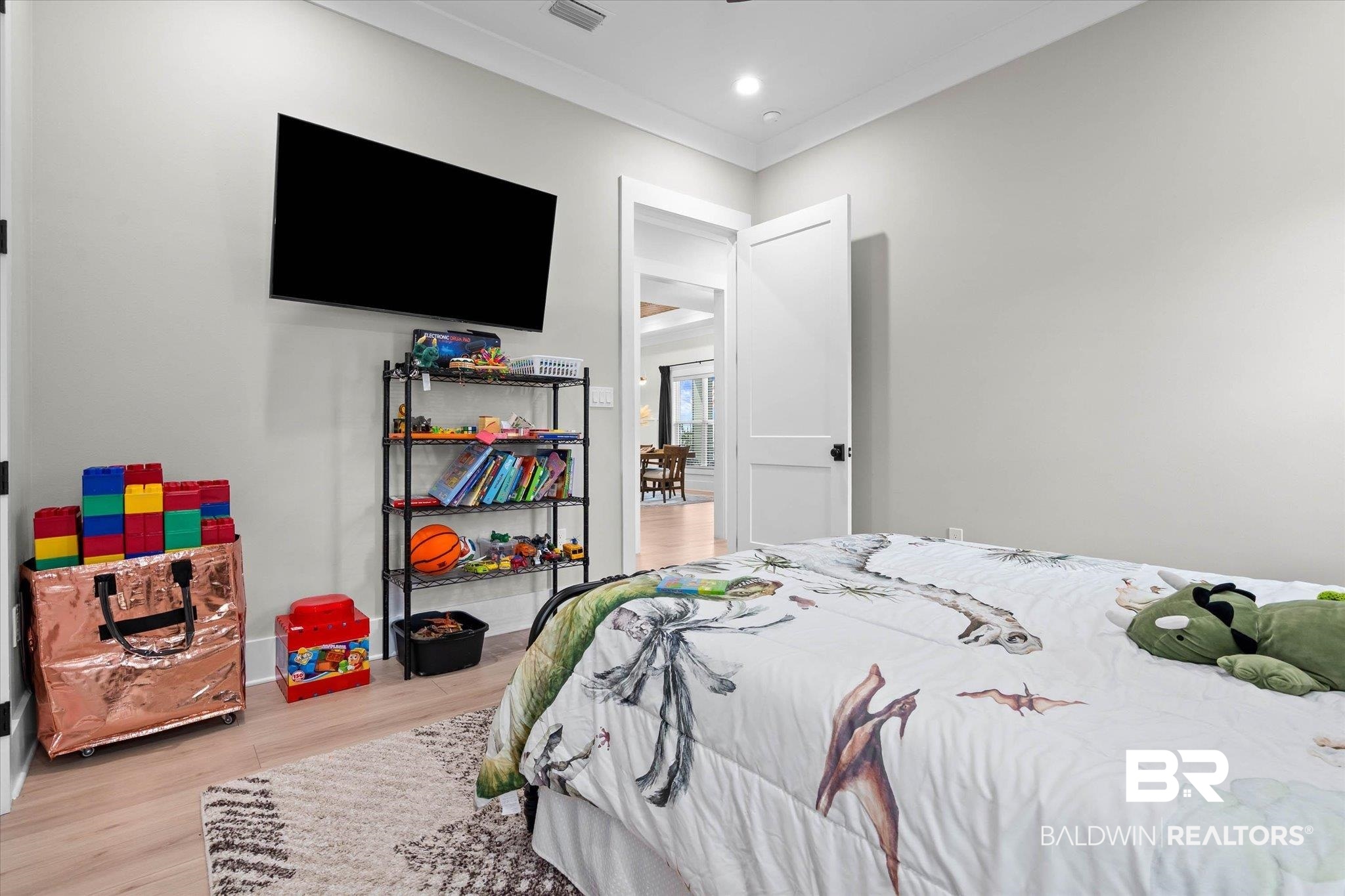 11 Creax Road Axis, AL 36505 - Photo 24 of 46 Room with light-toned wood-finish flooring and a neutral wall color