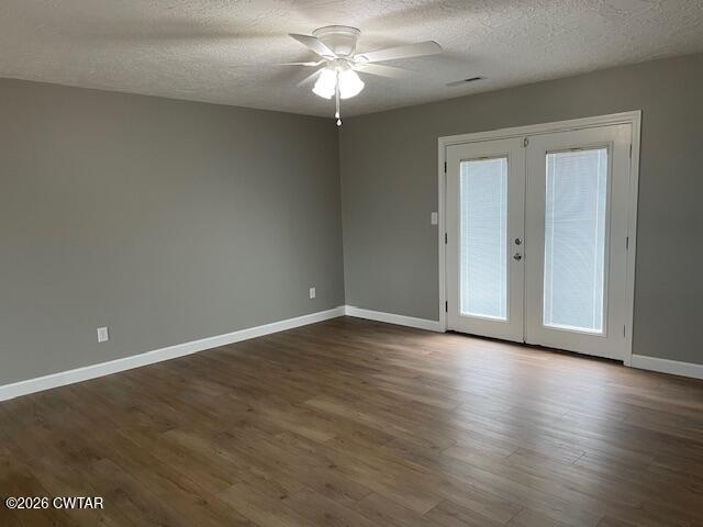 845 Gum Street Union City, TN 38261 - Photo 4 of 17 a view of an empty room with window and wooden floor