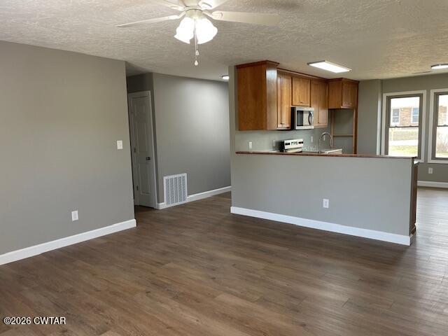 845 Gum Street Union City, TN 38261 - Photo 5 of 17 a view of kitchen with refrigerator and window