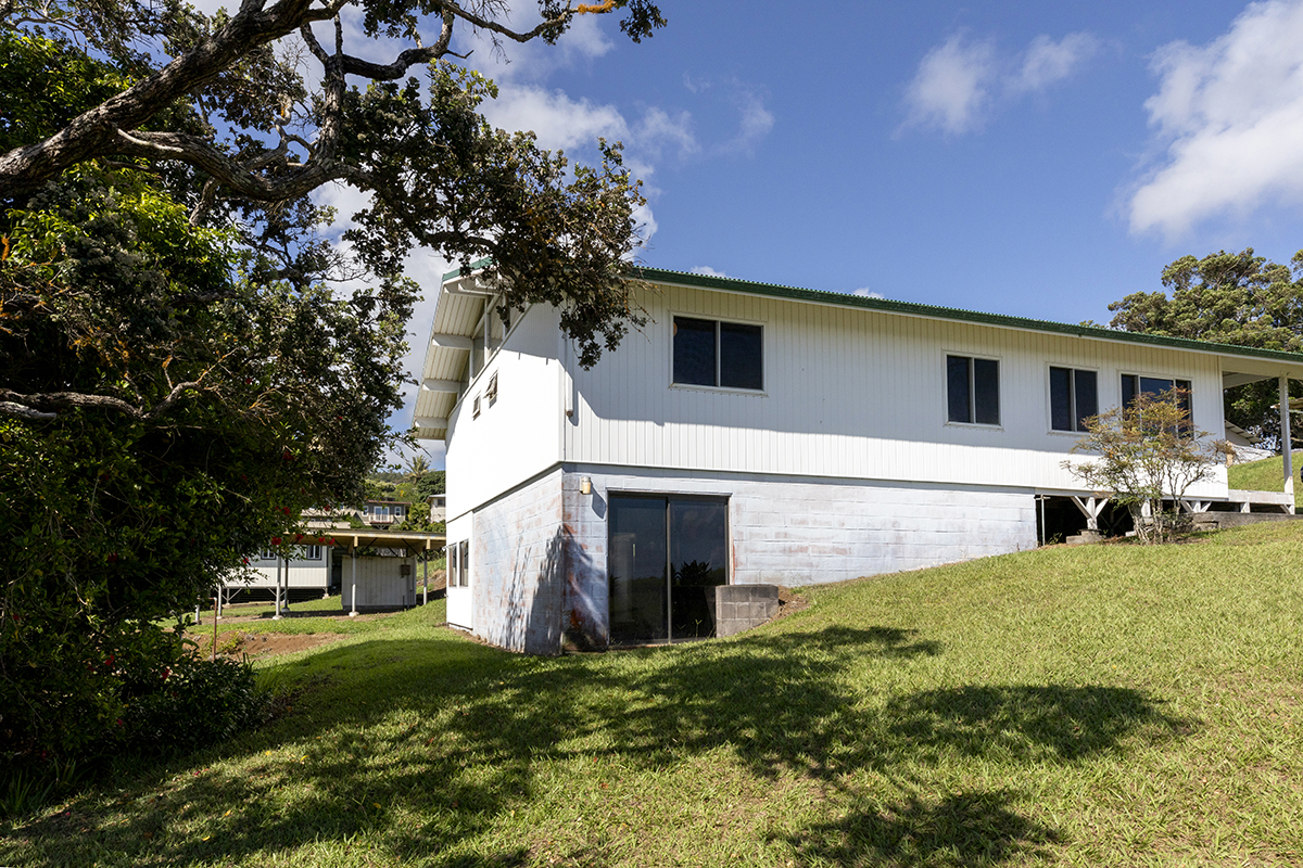 45-3303 Milo Street Honokaa, HI 96727 - Photo 25 of 28 a view of a house with a backyard