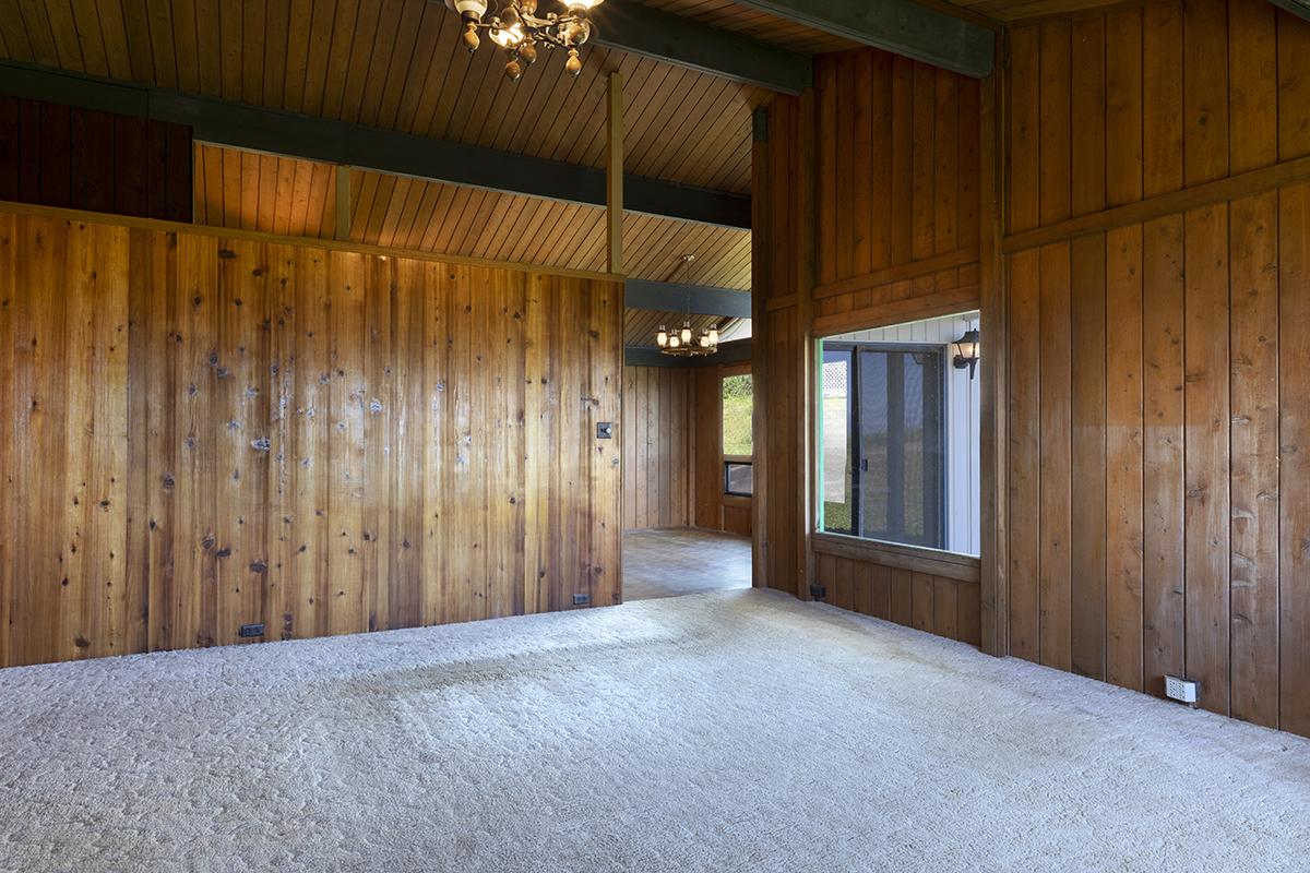 45-3303 Milo Street Honokaa, HI 96727 - Photo 8 of 28 a view of an empty room with wooden walls