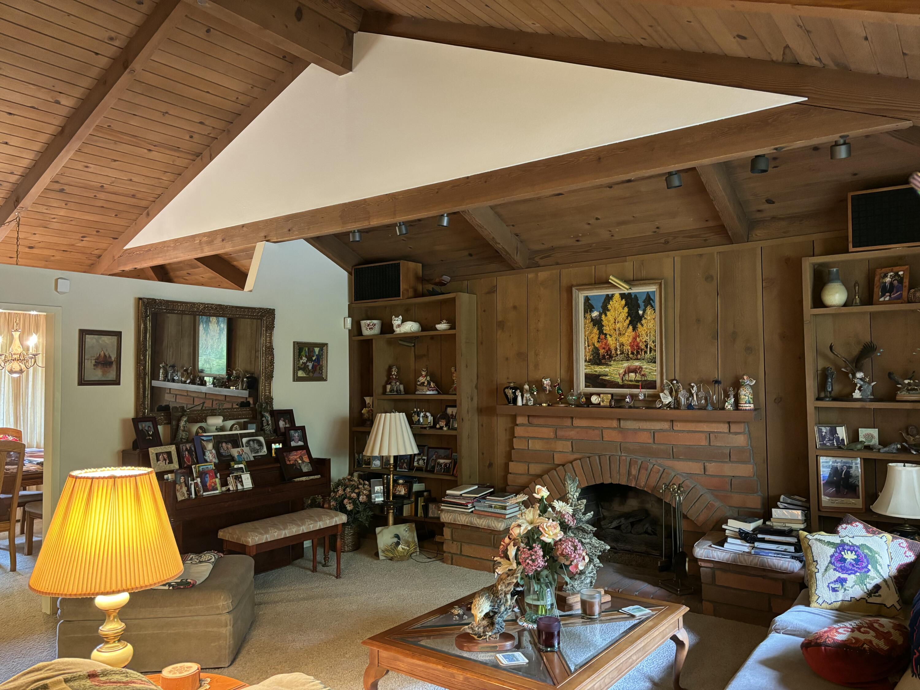2629 Quail Valley Road Solvang, CA 93463 - Photo 2 of 2 a living room with furniture and a fireplace