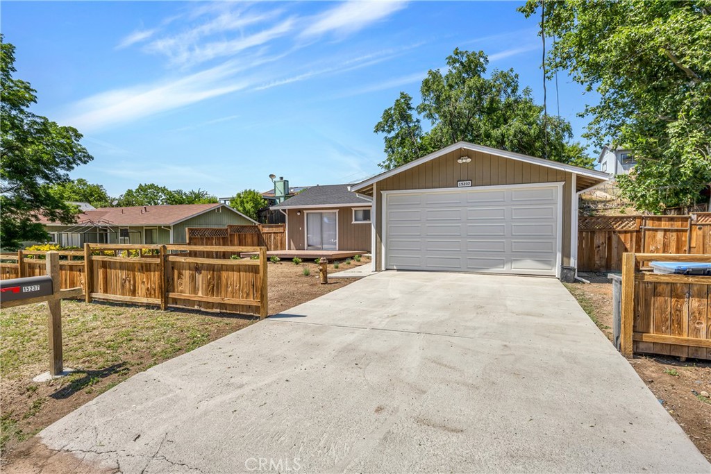 a view of a house with large outdoor space