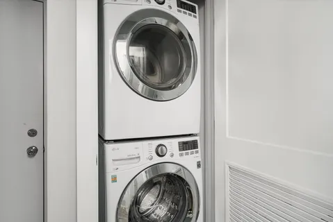 a view of entryway with washer and dryer