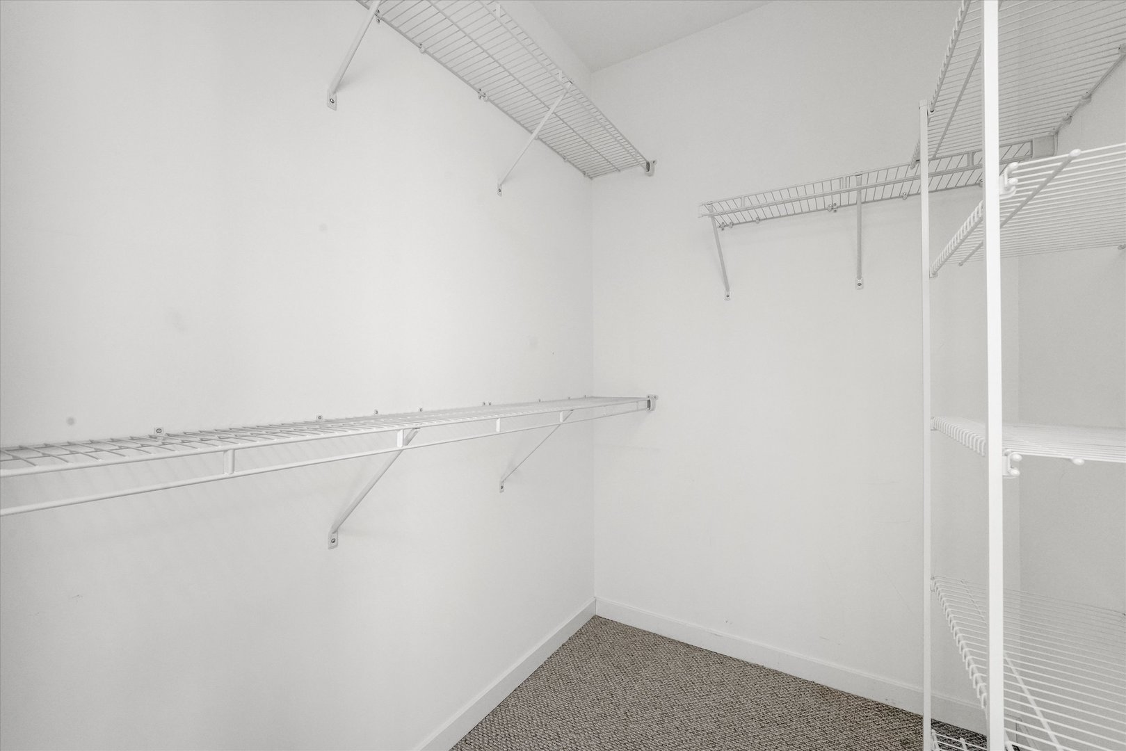 2529 West Congress Parkway, Unit 1 Chicago, IL 60612 - Photo 10 of 12 a view of a room with racks on the wall