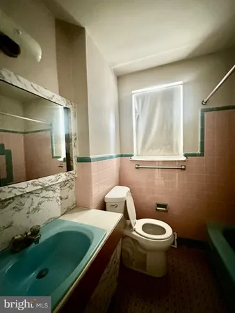 a view of an empty room with a windows