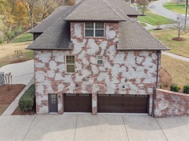 a front view of a house with wooden floor