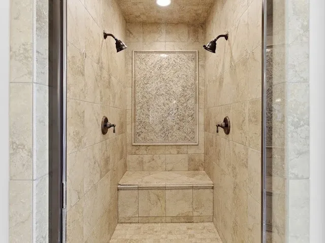 a view of entryway and hall with a front door